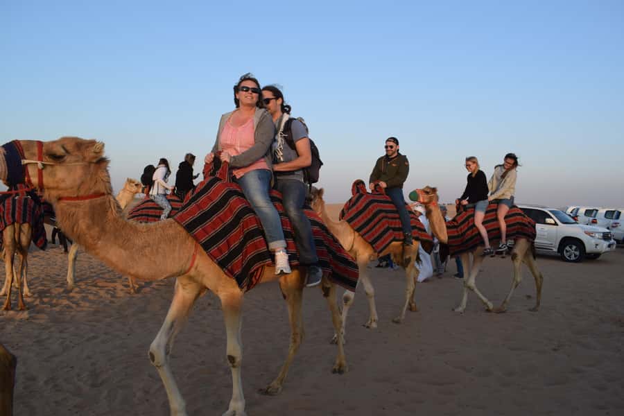 Dubai: Evening Tour with Quad Biking, Camel Ride, and BBQ - Dune bashing across Lahbab’s red sand