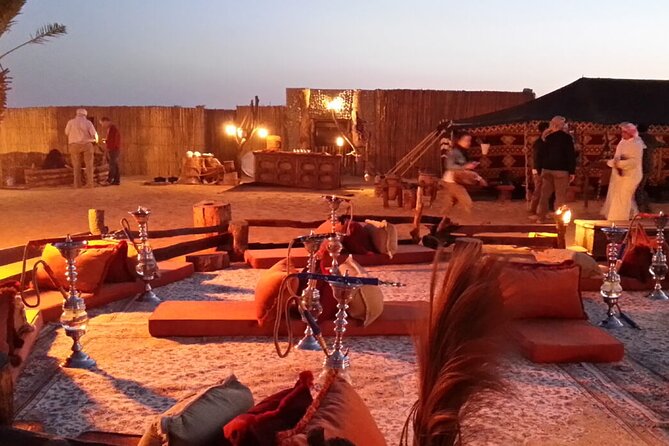 Dubai Evening4x4Desert Safari BBQ Dinner,4 Live Shows,Camel Ride - A traditional-style camp with coffee, dates, and henna