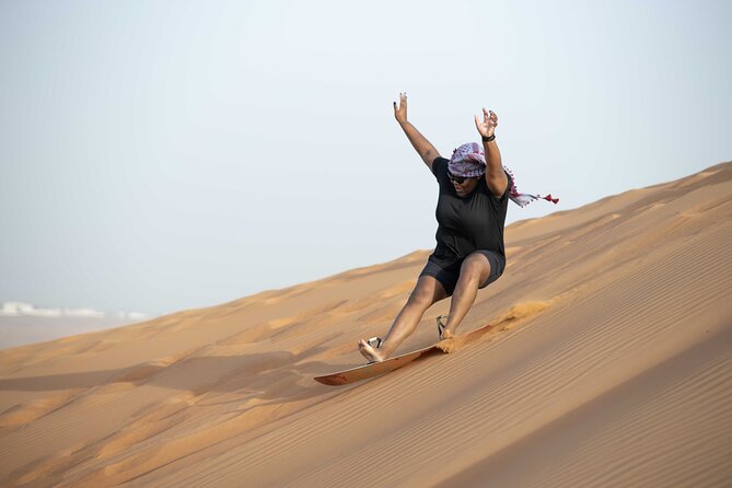 Dubai Half-day Red Dunes bashing with Sandboarding, Camel &Falcon - Who will enjoy this morning safari