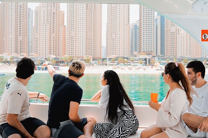 Dubai Harbour Luxury Yacht Tour with BBQ & Drinks - Looking up at Skydive Dubai