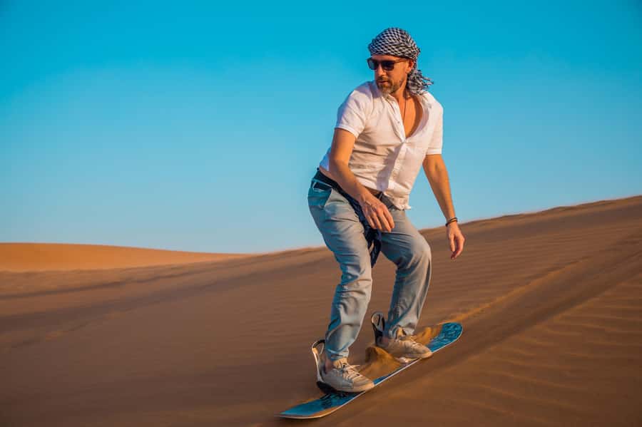 Dubai: Helicopter Ride, Desert Safari, Camels & Refreshments - Dune bashing with a professional driver