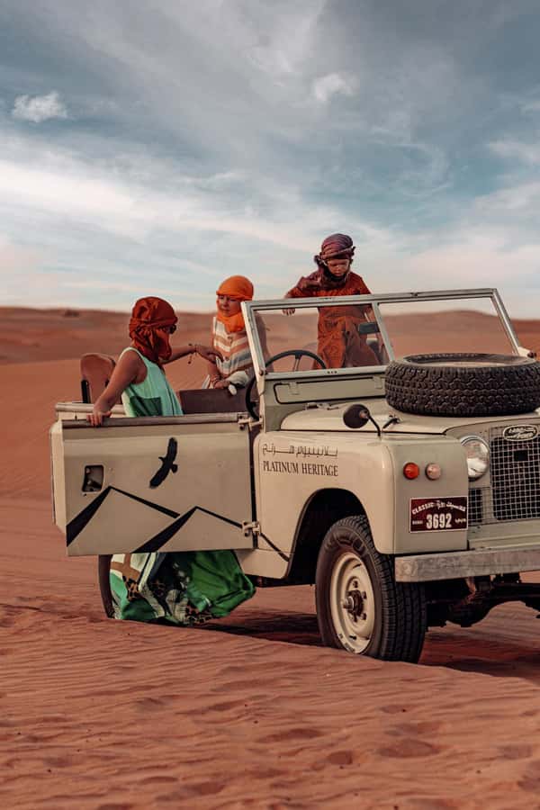 Dubai: Heritage Safari in Vintage Land Rover with Dinner - Falconry with the sun going down
