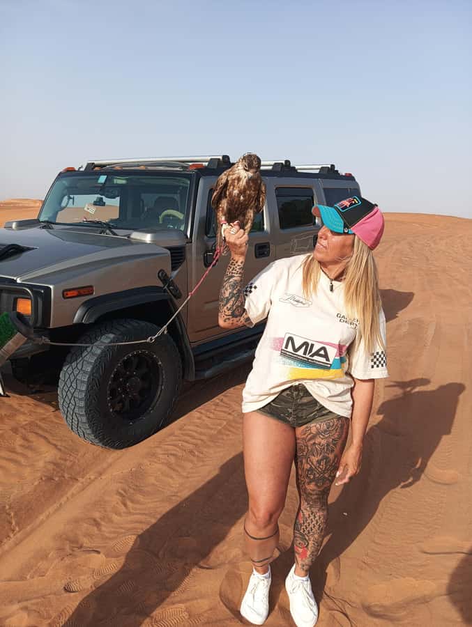 Dubai Hummer Safari Adventure & Traditional Dress Photoshoot - Sunset photos, sandboarding, and the traditional dress session