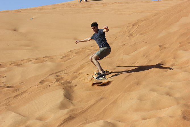 Dubai: Jeep Desert Safari, Camel Ride, and Quad Bike Tour - Sandboarding and desert photographs