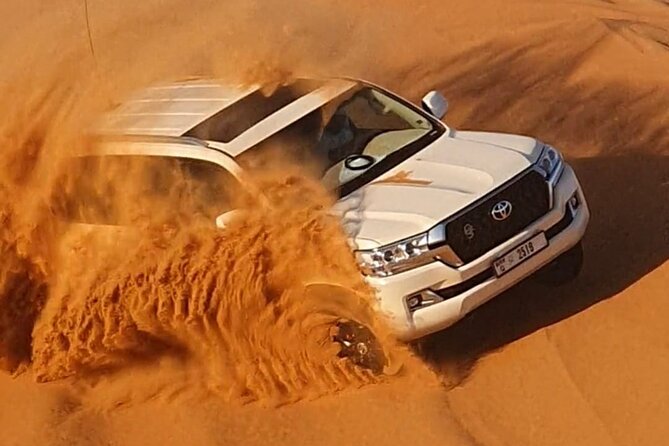 Dubai: Jeep Desert Safari, Camel Ride, and Quad Bike Tour - Al Aweer Camp, BBQ, and entertainment