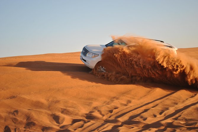 Dubai: Jeep Desert Safari, Camel Ride, and Quad Bike Tour - Guides, group size, and the feel of the day