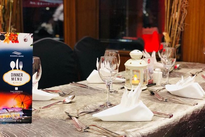 Dubai Marina Dinner Cruise with Live Music & Open Bar - Booking, Weather, and Cancellation Details