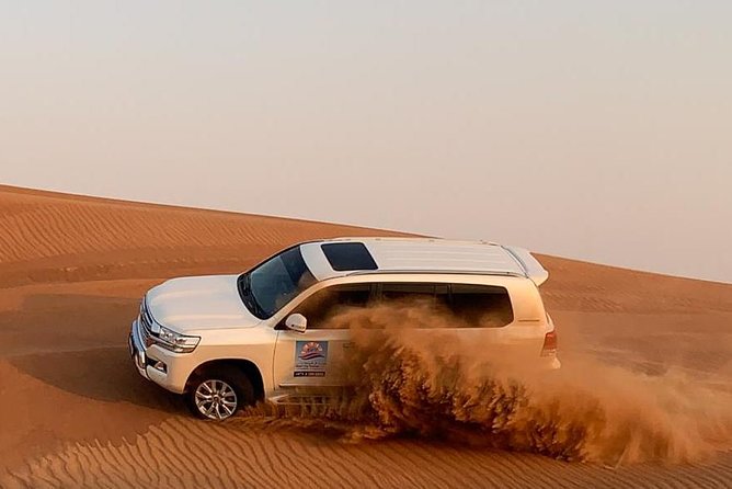 Dubai Morning Desert Safari: Camel Ride & Sandboarding! - Reaching the red dunes of Lahbab