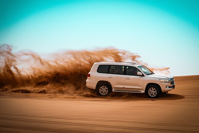 Dubai Morning Desert Safari with Quad Biking & More Activities - The camel ride is brief, but it adds a traditional touch