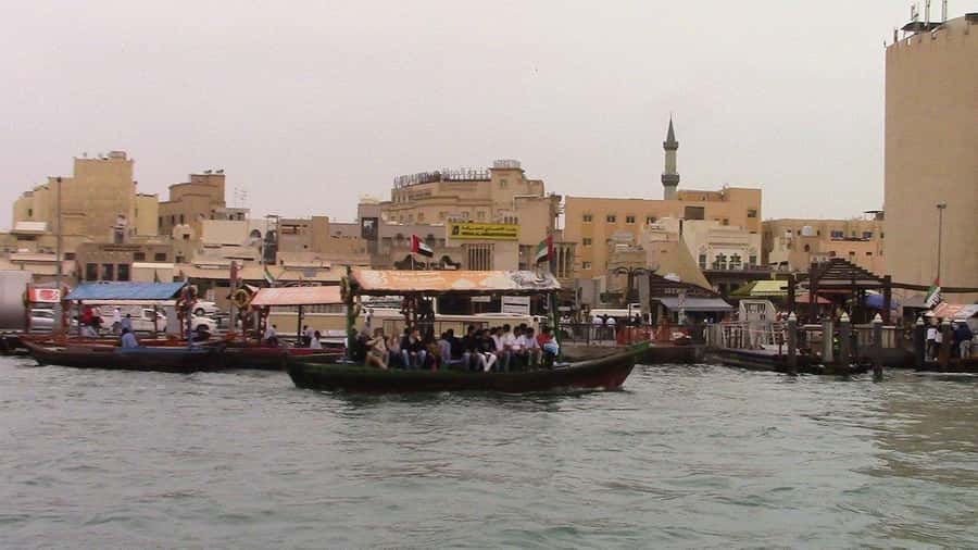 Dubai: Old City Walking Tour with Abra Ride - Coffee, dates, and a small taste of local life
