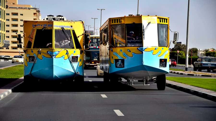 Dubai: Old town tour with Wonder Bus, souks, Creek and Guide - Textile Market, Heritage Village, and the old city streets