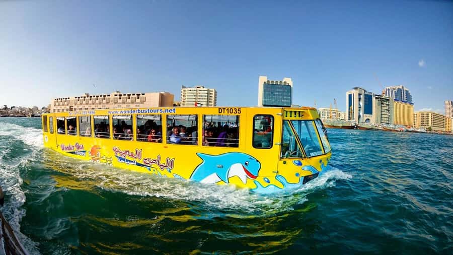 Dubai: Old town tour with Wonder Bus, souks, Creek and Guide - What one hour really gives you