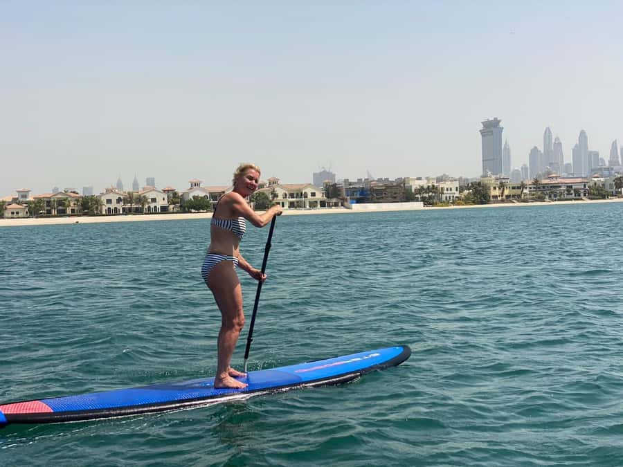Dubai: Palm Jumeirah Paddle Boarding Tour - A quick swim and the return paddle