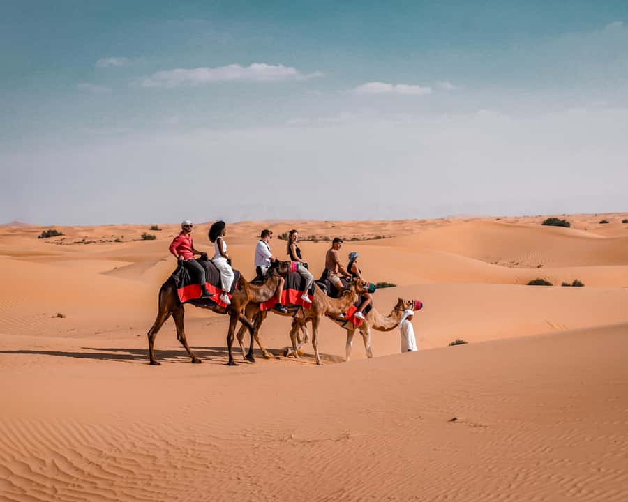 Dubai: Premium Desert Safari, Camel Ride, BBQ & Sandboarding - Belly dancing, Tanoura, and fire