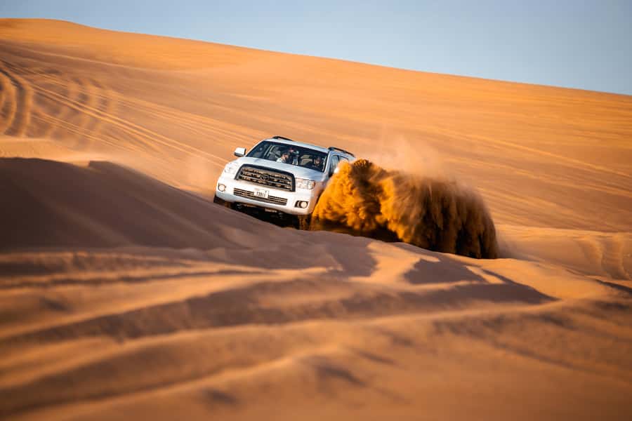 Dubai: Premium Red Dune Safari with Sandboarding & BBQ - A short camel ride, not a long trek