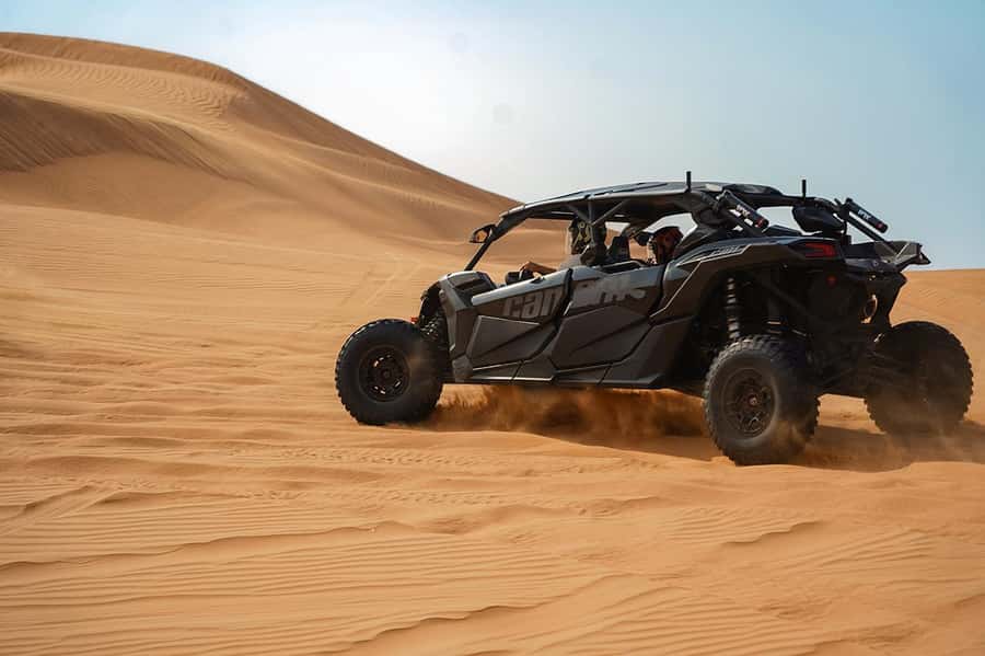 Dubai: Quad Bike, Dune Buggy, and Sandboarding Experience - Sandboarding down Dubai’s dunes