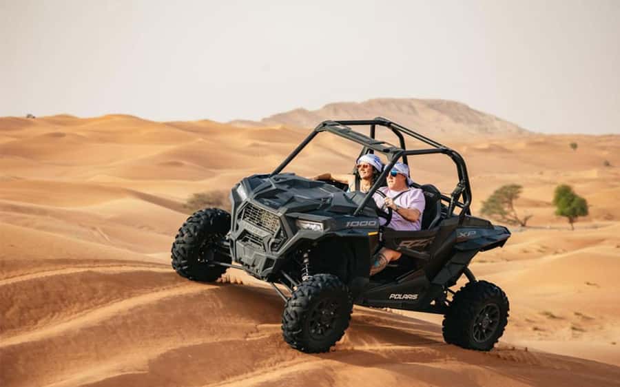 Dubai: Quad Bike, Dune Buggy, and Sandboarding Experience - What the one-hour quad bike stop includes
