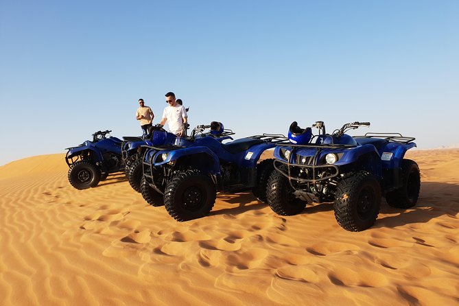 Dubai: Quad Bike Safari, Camels, & Camp with BBQ Dinner - Sunset photos and a five-minute camel ride