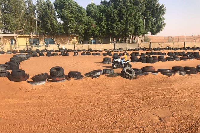 Dubai Quad Biking with Desert Safari - Thrilling ATV Ride Dubai - Dinner, drinks, and the evening show