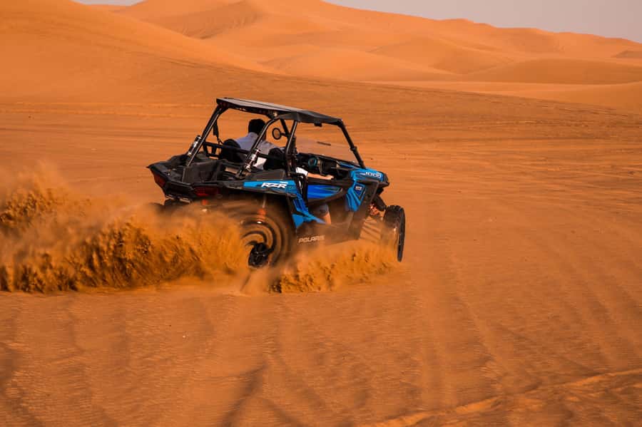 Dubai: Red Dune Desert Safari, Quad Bike, Camels, and BBQ - Dune bashing: thrilling, not gentle
