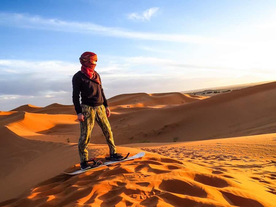Dubai: Red Dune Safari, Quad Bike, Camel Ride, BBQ Dinner - Sunset gives the trip its sense of place