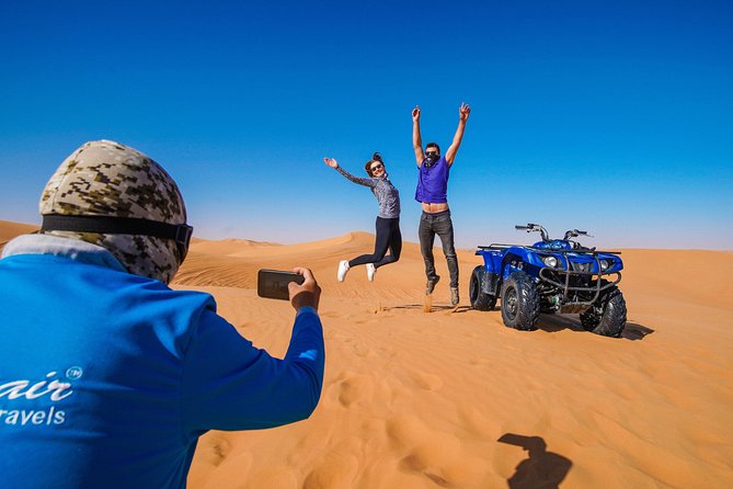 Dubai Red Dunes ATV, Camels, Stargazing & 5<em> BBQ Al Khayma Camp – Key points to know before booking’ /></p>
<ul>
<li><strong>Red dunes and a one-hour ATV circuit:</strong> Ride in open Lahbab desert after a safety briefing, with a helmet and an accompanying guide.</li>
<li><strong>Evening is the best-value departure:</strong> It includes the sunset stop, dinner, live entertainment, fire show, and stargazing.</li>
<li><strong>Al Khayma Camp is the longest stop:</strong> Plan on about three hours for the camel ride, food, photos, henna, shisha, shows, and desert sitting.</li>
<li><strong>Pickup covers Dubai, Sharjah, and Ajman in selected areas:</strong> Your exact pickup time is usually about 45 minutes before departure.</li>
<li><strong>The ATV is not a casual amusement ride:</strong> You need basic driving skills, must sign an indemnity form, and accept responsibility for damage and injury.</li>
<li><strong>At about $88, the value comes from the package:</strong> The price makes more sense if you want transport, riding, dinner, entertainment, and several cultural activities in one outing.</li>
</ul>
<h2>The red-dune ride is the heart of the day</h2>
<p> BBQ Al Khayma Camp – The red-dune ride is the heart of the day’ /></p>
<p><p>The journey begins with pickup from your Dubai hotel or selected address in an air-conditioned vehicle. Pickup is also offered from parts of Sharjah and Ajman, though some locations may cost extra. Be ready in the lobby, since pickup is scheduled about 45 minutes before your chosen departure time.</p>
</p>
<p><p>The drive takes you away from Dubai’s towers and toward Lahbab, an area known for red-orange dunes. On arrival, you can sit in an air-conditioned tent with Arabic tea, coffee, and dates before gearing up. That short pause matters, especially in hot weather, because the ATV section takes place in exposed sun and soft sand.</p>
</p>
<p><p>You receive a helmet and a safety briefing before setting off. The ride lasts about 60 minutes and follows your instructor through an open desert circuit. The pace can be lively, with sandy climbs, soft patches, and plenty of chances to stop for photographs.</p>
</p>
<p><p>You do not need to be an expert driver, but you should have basic driving knowledge and a moderate level of fitness. The operator requires riders to be over 14. Children aged 13 and under cannot ride, so this is not a suitable family activity for younger children.</p>
</p>
<p><p>The exact feel of the ride depends on your driving confidence. You can take the easier course near the main building, or choose the route with hills and softer sand for a more demanding run. If you want excitement, listen closely to the instructor and choose the more open route only if you feel comfortable controlling the ATV.</p>
</p>
<p><p>Guides have earned much of the praise for this part of the day. Dennis, Youness, Omar, Anas, Fazil, Asif Foji, Abdul Wahab, and Imran Khan are among the guides singled out for friendly help, clear explanations, photography, and attention to comfort. The guide stays involved instead of simply pointing you toward the bikes and walking away.</p>
</p>
<div class="twil" style="margin: 20px 0; padding: 15px 0;"><p>More Camel Rides in Dubai</p><ul style="margin: 10px 0; padding-left: 0; list-style: none;"><li style="margin: 0 0 12px 0; padding: 0 0 12px 0; border-bottom: 1px solid #E6E1EF; line-height: 1.4;"><a href="https://middleeastguides.com/dubai-desert-safari-quad-bike-camel-ride-al-khayma-camp/">Dubai: Desert Safari, Quad Bike, Camel Ride & Al Khayma Camp</a><br><span style="font-size: 0.82em; color: #555;"><span style="color: #4A2C8C;">★</span> 4.9 &nbsp;&middot;&nbsp; 68,962 reviews</span></li><li style="margin: 0 0 12px 0; padding: 0 0 12px 0; border-bottom: 1px solid #E6E1EF; line-height: 1.4;"><a href="https://middleeastguides.com/dubai-desert-safari-quad-bike-camel-ride-and-sandboarding/">Dubai: Desert Safari, Quad Bike, Camel Ride and Sandboarding</a><br><span style="font-size: 0.82em; color: #555;"><span style="color: #4A2C8C;">★</span> 4.9 &nbsp;&middot;&nbsp; 43,505 reviews</span></li><li style="margin: 0; padding: 0; border-bottom: none; line-height: 1.4;"><a href="https://middleeastguides.com/dubai-safari-quad-bike-camel-ride-and-buffet-dinner/">Dubai: Safari, Quad Bike, Camel Ride, and Buffet Dinner</a><br><span style="font-size: 0.82em; color: #555;"><span style="color: #4A2C8C;">★</span> 4.9 &nbsp;&middot;&nbsp; 33,424 reviews</span></li></ul></div><h2>Sandboarding adds a quick second thrill</h2>
<p><img width="669" height="446" decoding="async" src=