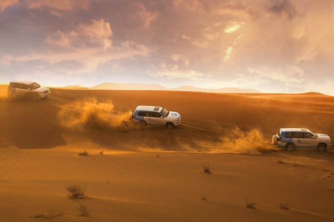 Dubai Red Dunes Desert Safari, Quad Bike, Camels at Al Khayma - Lahbab: dune bashing, sandboarding, and camel time