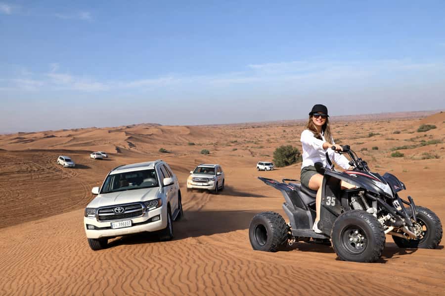 Dubai: Red Dunes Evening Quad Bike, Dune Blast with BBQ - Quad biking across the open sand