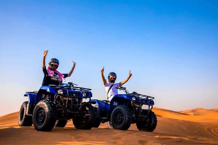 Dubai: Red Dunes Quad Bike, Dune Buggy, Camel & Refreshments - Heat, clothing, and the small things that matter