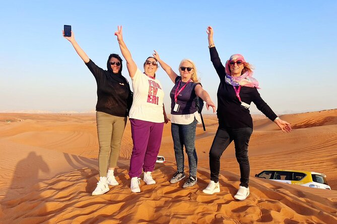 Dubai Red Dunes Safari, ATV, Camel ride, BBQ at Desert Camp - BBQ dinner, drinks, and evening shows