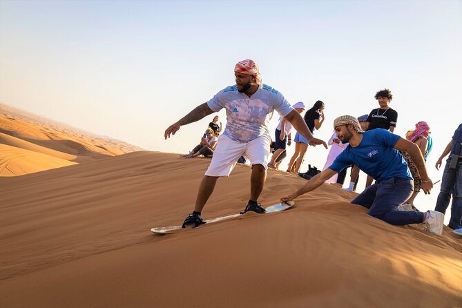 Dubai Red Dunes with Sandboarding, Camel Ride, Falcon & VIP Camp - Twenty minutes of sandboarding on the dunes