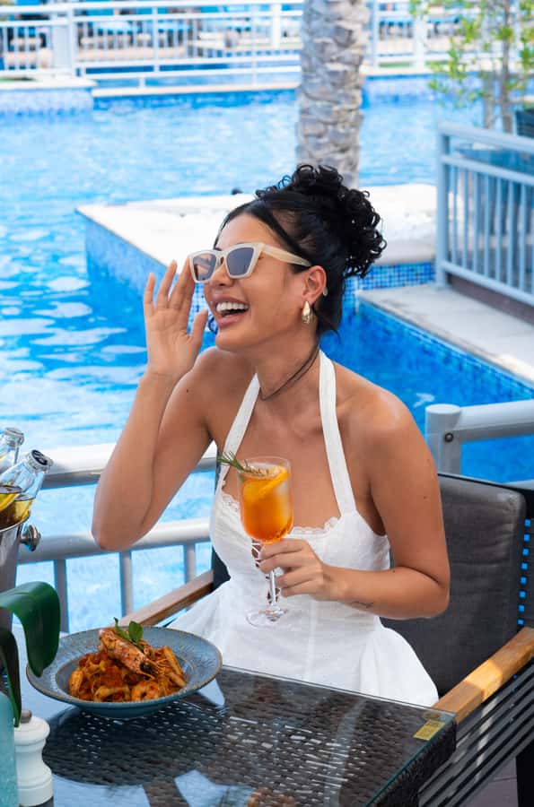 Dubai: Riva Beach Club Pool and Beach Day Pass - A Palm Jumeirah day with pool, beach, and skyline views