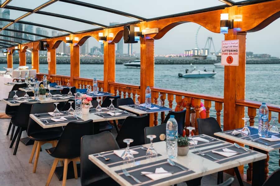 Dubai: Scenic Dhow Cruise with Buffet Dinner and Live Shows - The boat, mood, and evening views