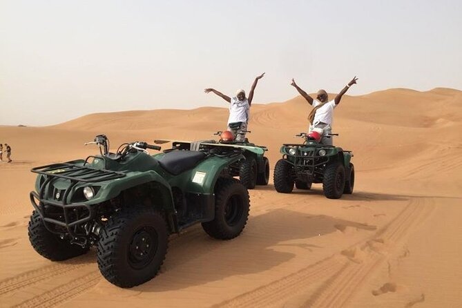 Dubai Self-drive Quad Bike, Sand Boarding, Camels & Refreshments - Photos, guides, and the human side of the tour