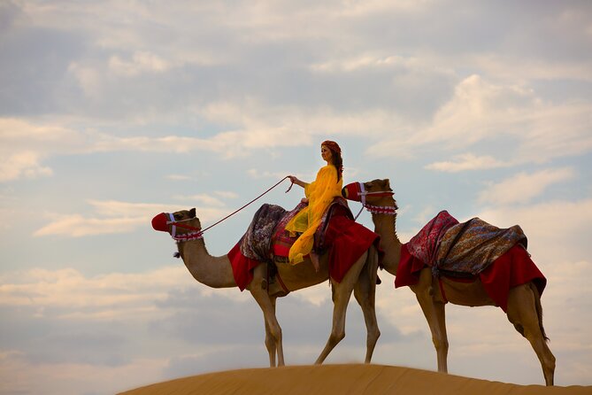 Dubai Self-drive Quad Bike, Sand Boarding, Camels & Refreshments - Taking control of the quad bike