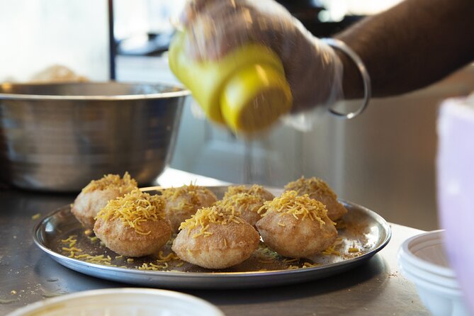 Dubai Souks, Food & Culture Walking Tour - Guides, group size, and the pace of the morning