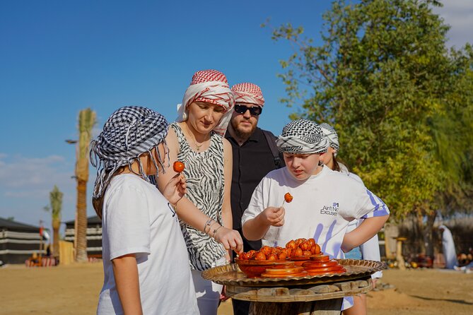 Dubai: Sunset Camel Trek, Al Khayma Camp, Stargazing & BBQ - Falcon photos and camel feeding