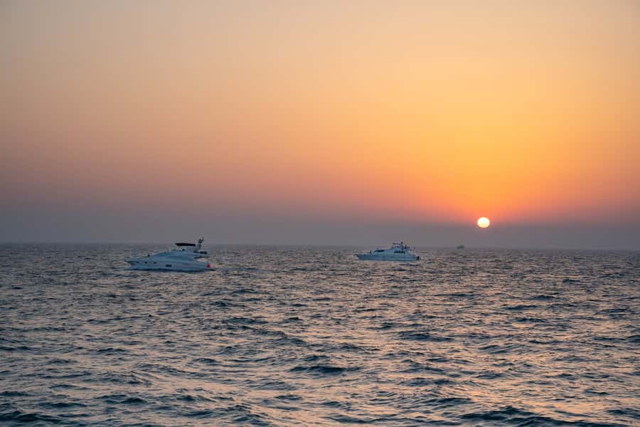 Dubai: Sunset & Night Cruise with Bites and Drinks - Atlantis and the open-water photo stops