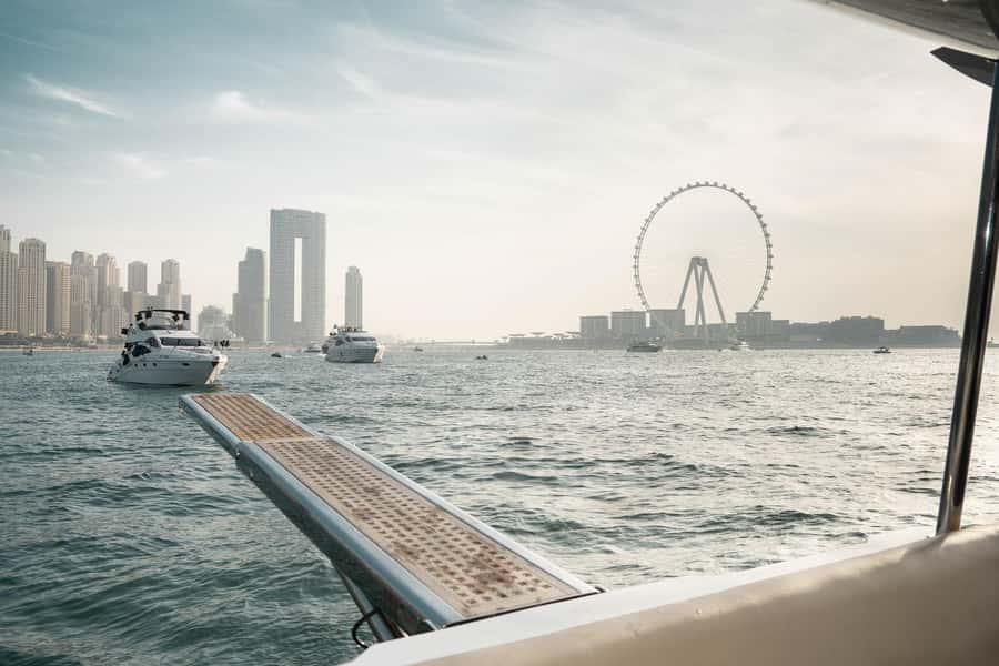 Dubai: Sunset & Night Cruise with Bites and Drinks - Burj Al Arab and the return along the coast