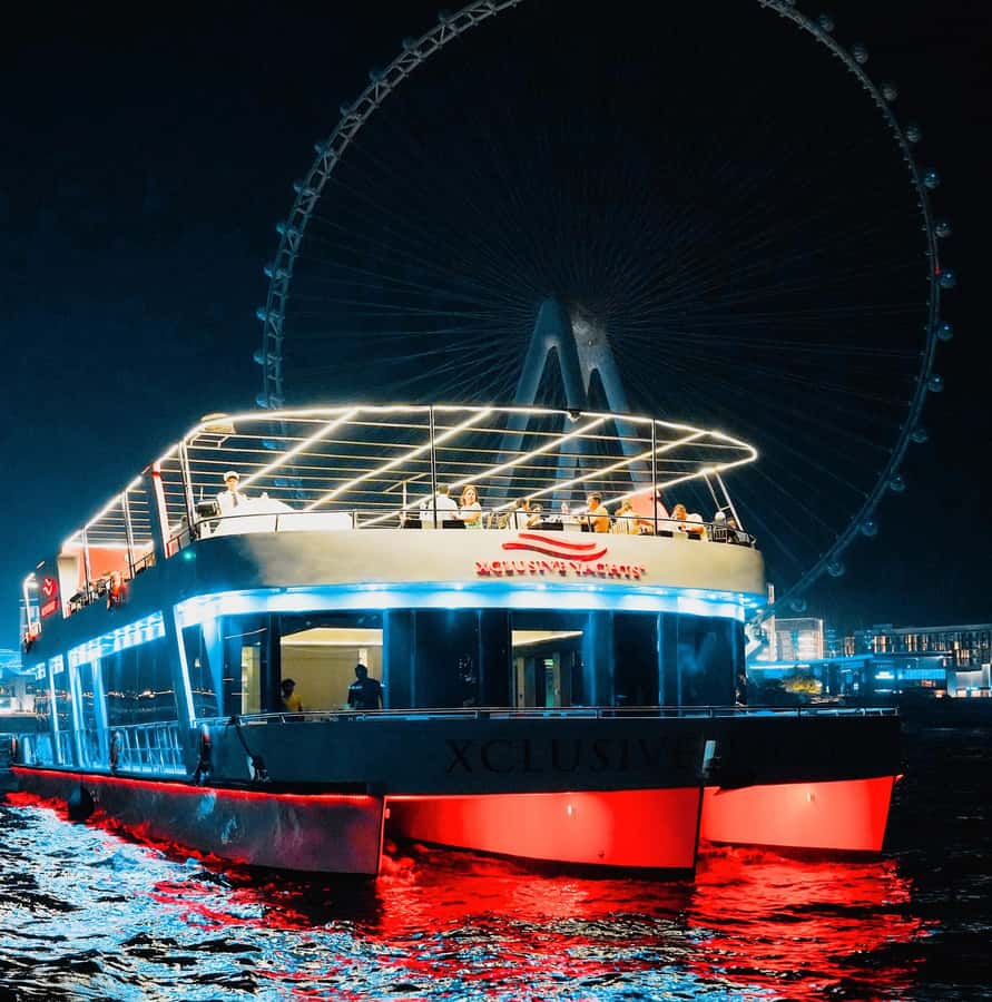 Dubai: Sunset or Dinner Cruise with Live Music & Open Bar - Dubai Marina from a yacht, not a roadside viewpoint