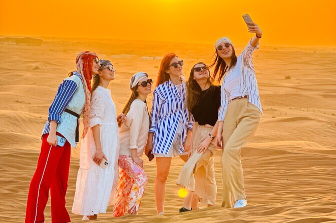 Dubai Sunset Red Dune Desert Safari, Sandboarding and Camel Ride - Red dunes, sunset, and a four-hour plan