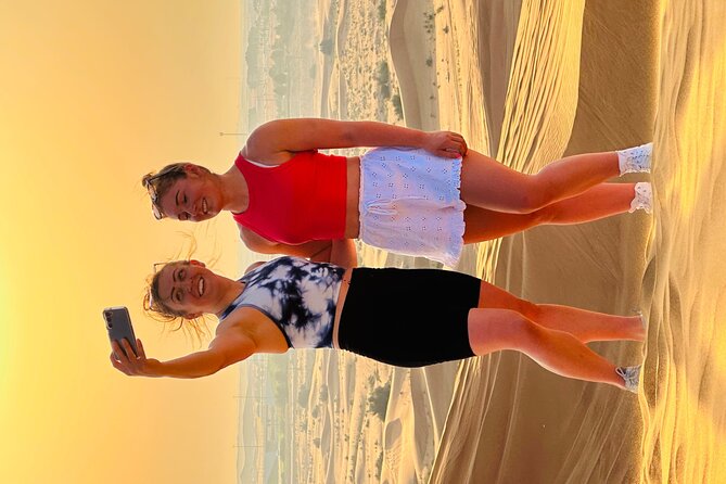Dubai Sunset Red Dune Desert Safari, Sandboarding and Camel Ride - What the guide can add to the experience