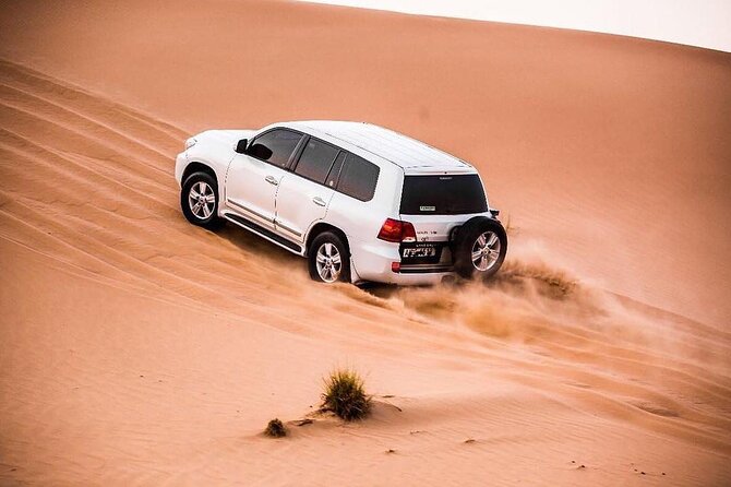Dubia 4x4 Dune Bashing, Sandboarding, Camel Riding and Bbq Dinner - Pickup and the 2:30 pm start