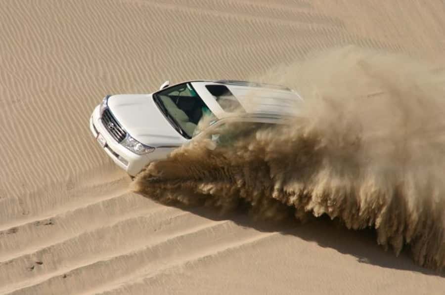 Dune Bashing, Sandboarding, Camel Ride & Optional ATV Ride - Optional ATV riding on the desert track