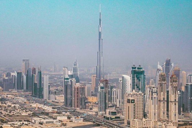 DXB Private Half-Day Dubai City Tour: Iconic Sights & Landmarks - Palm Jumeirah and Atlantis from the road
