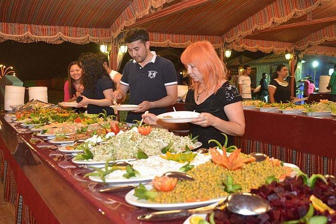 Evening Desert Adventure: Quad Biking, Sandboarding & Camel Ride - Arabic coffee, dates, and the desert camp