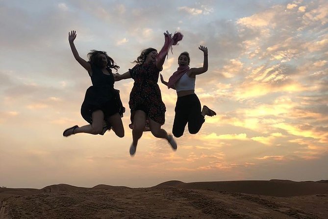 Evening Desert Safari & BBQ With Live Shows,Camel Ride,Falcon pic - Arabic coffee, dates, henna, and the Al Awir camp