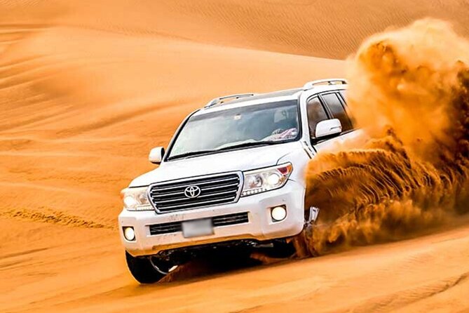Evening Desert Safari Dubai with Camel Riding & BBQ Buffet Dinner - Dune bashing: the main attraction