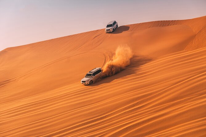 Evening Desert Safari with ATV Quad Bike Dune Bashing BBQ Dinner - Camel riding and a slower desert pause