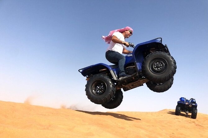 Evening Desert Safari with ATV Quad Bike Dune Bashing BBQ Dinner - Arabic hospitality at the desert camp